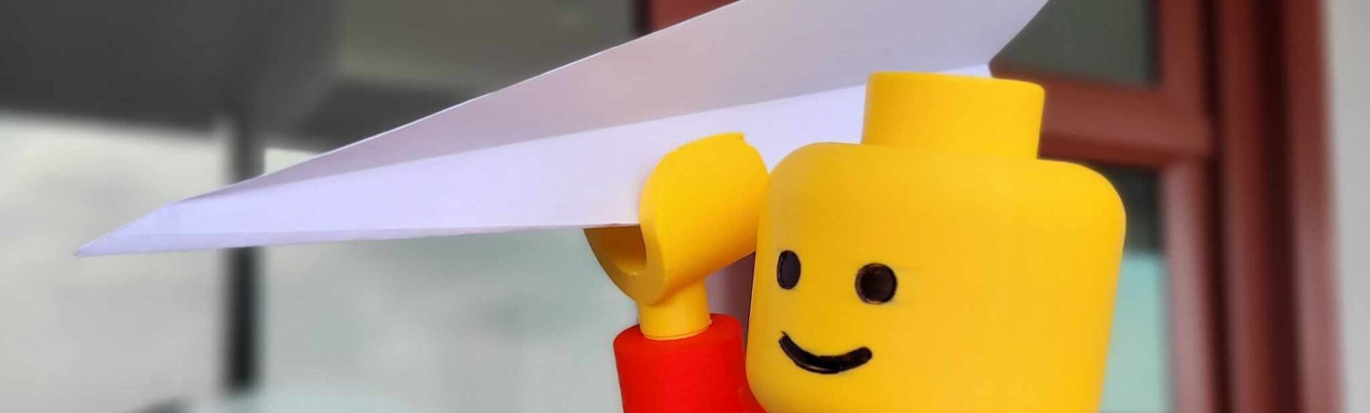 Lego Man does STEM2GO Paper Plane Challenge