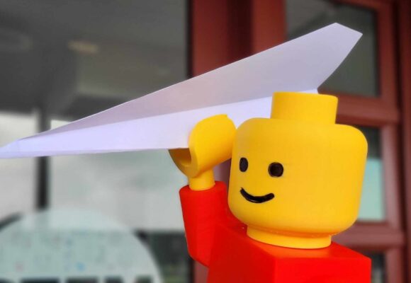 Lego Man does STEM2GO Paper Plane Challenge