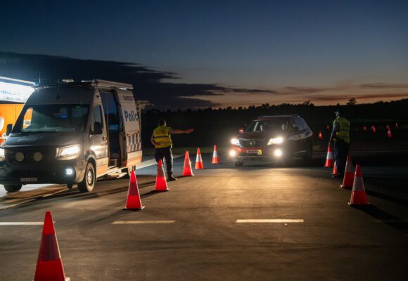 NSW Police officers waving learner driver into random breath testing practice setup